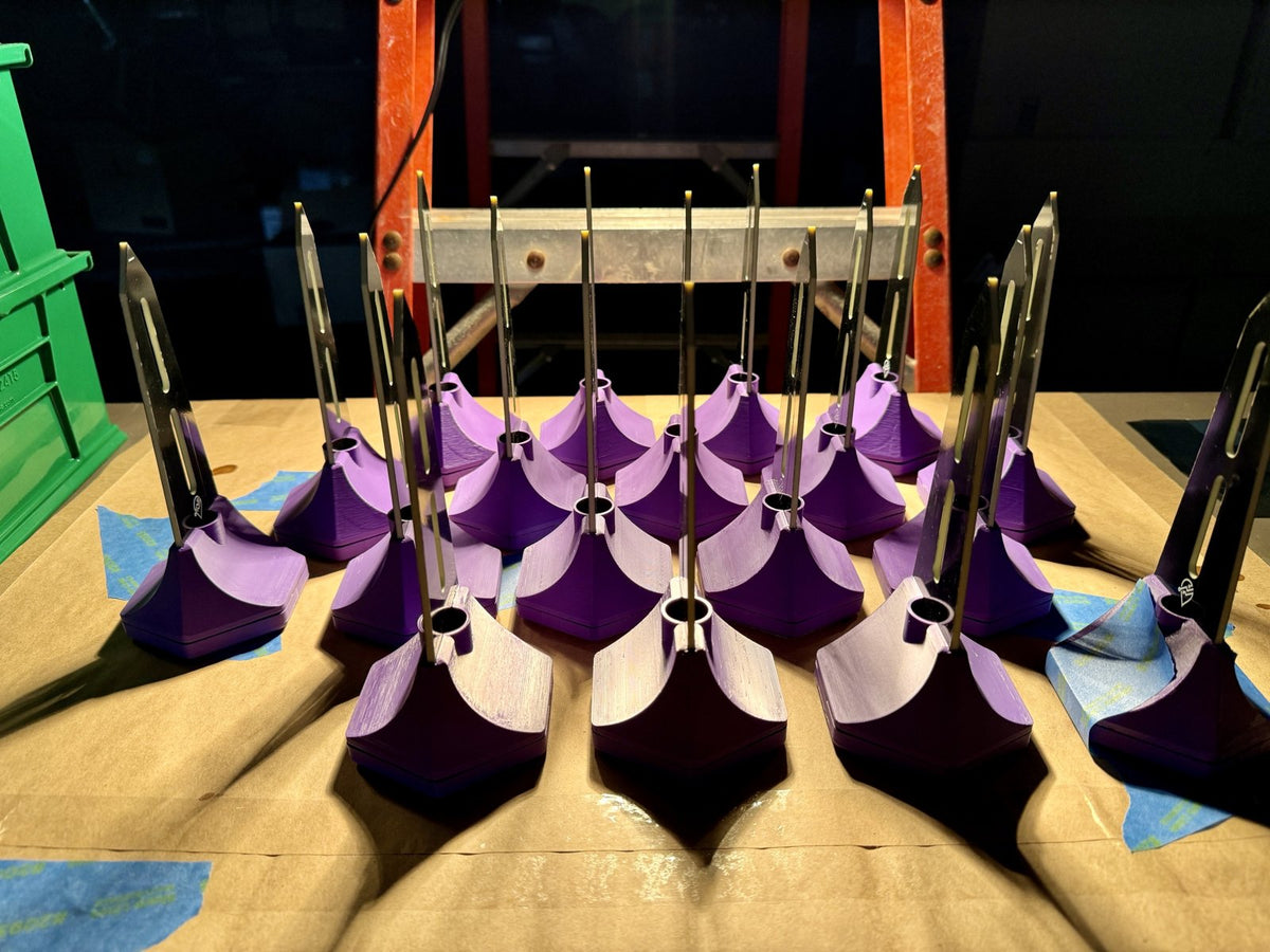 A batch of BLADE sensors with probes fitted, curing on the bench