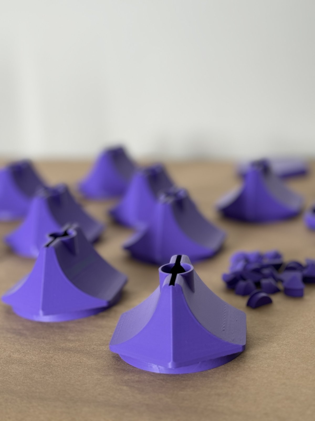 A batch of purple BLADE housings fresh off the printer