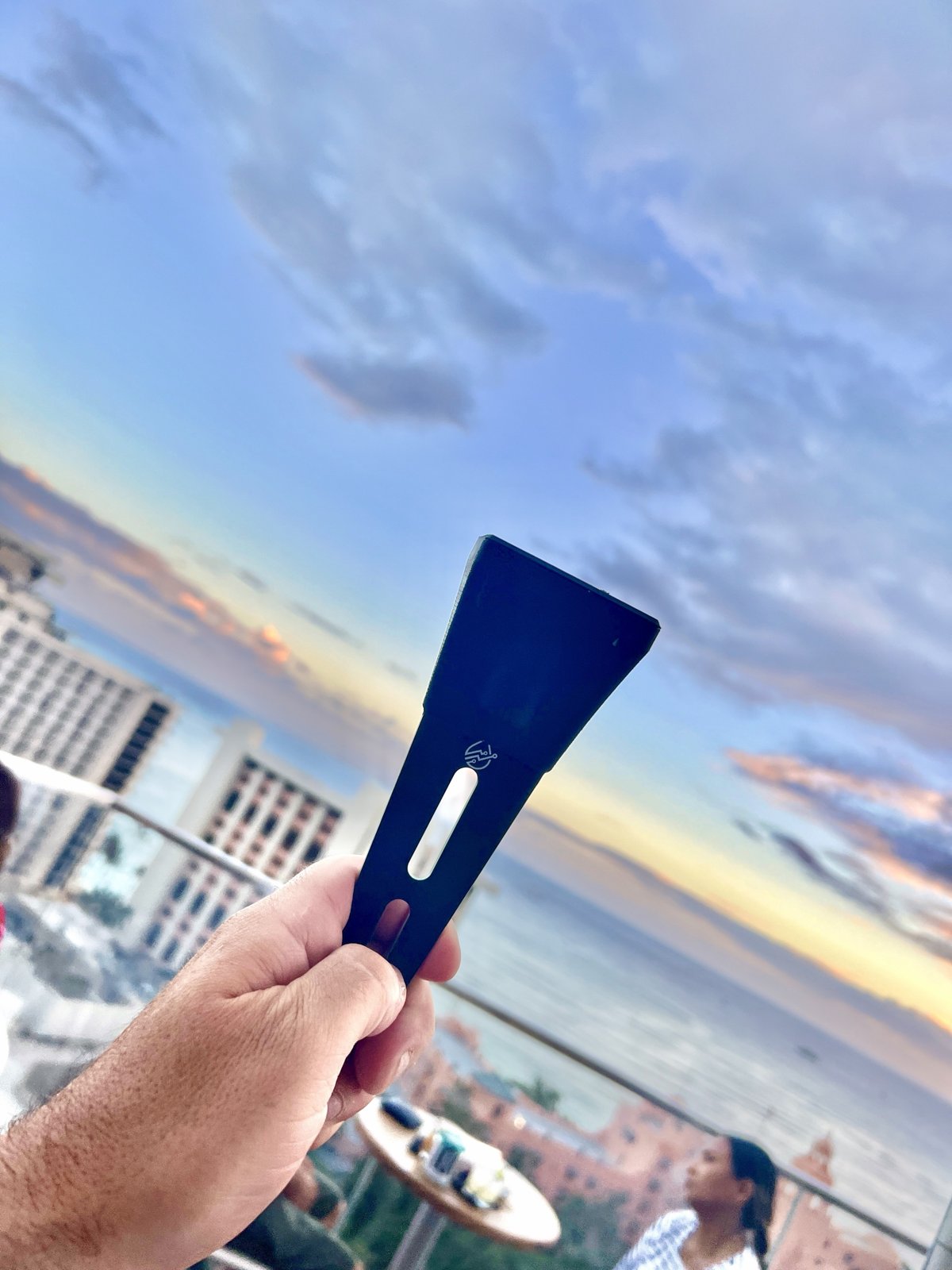 The BLADE probe held up against a Waikiki sunset